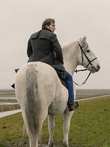 Affiche de L'homme au cheval blanc, film à voir en streaming sur Pygargue