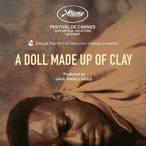 Photo A Doll Made Up Of Clay