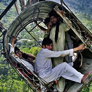 Photo Hanging By A Wire