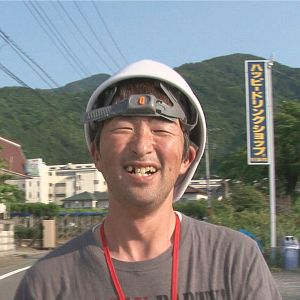 Photo He-Kun arpente sa ville