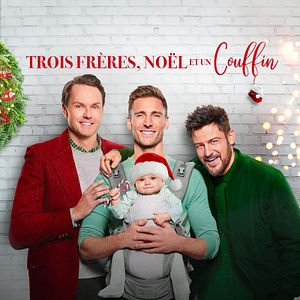 Photo Trois frères, Noël et un couffin
