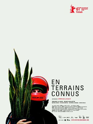 En terrains connus : Affiche